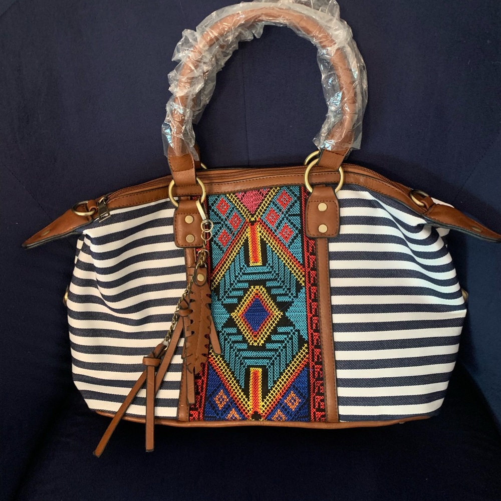 Navy and white striped purse. Colorful middle accent.